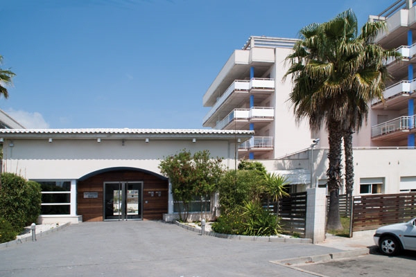 Entrance area of the big building in Roses