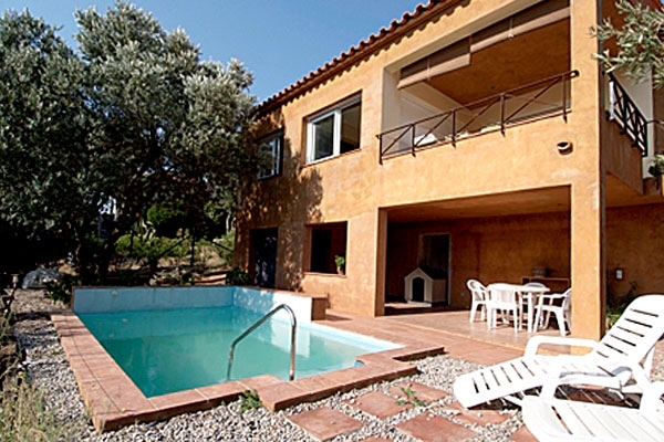 Covered terrace and garden with pool